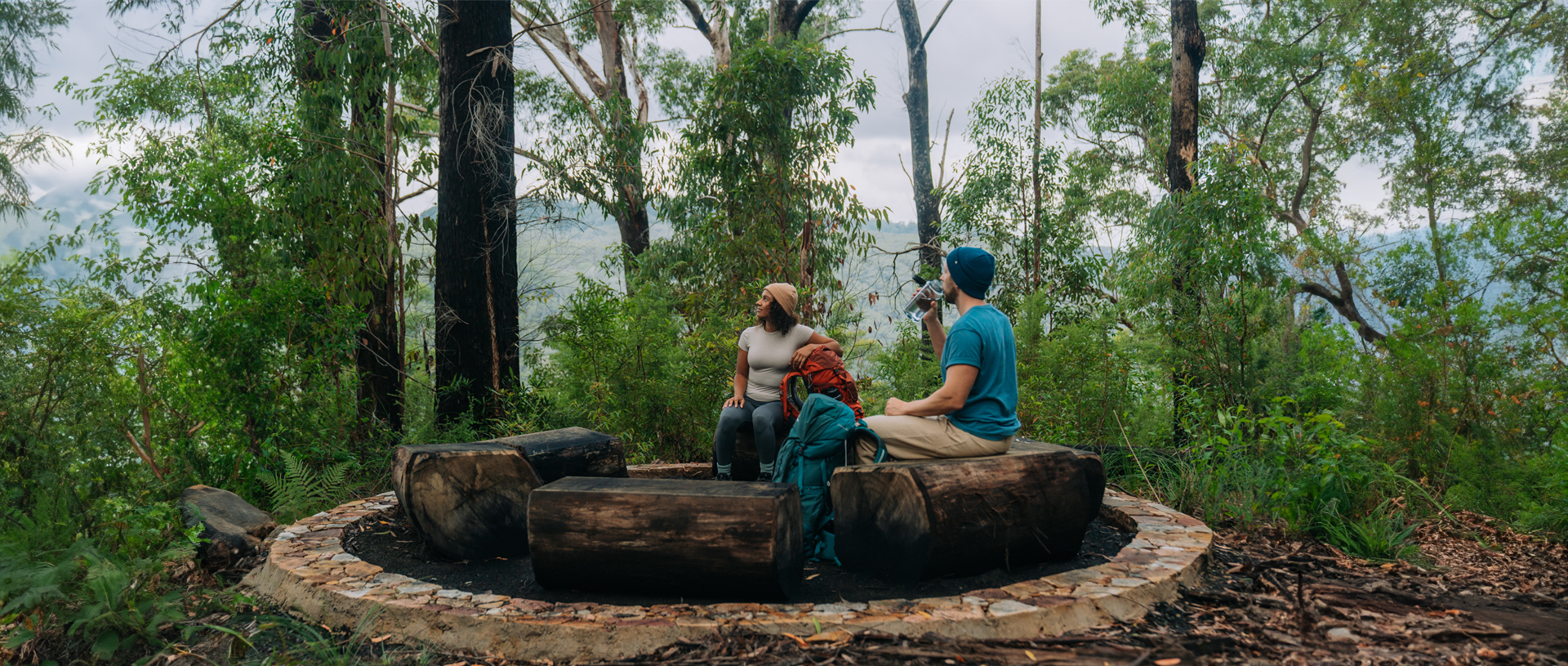 Walkers sitting at the yarning circle at Weeun Weeun campground. Credit: Remy Brand/DCCEEW &copy; Remy Brand