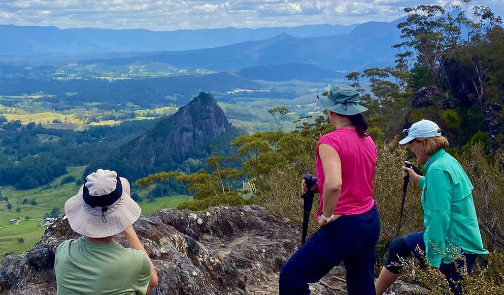 Walkers enjoying a view over valleys on a Gidjuum Gulganyi guided walk. Credit &copy; Connect Adventures 