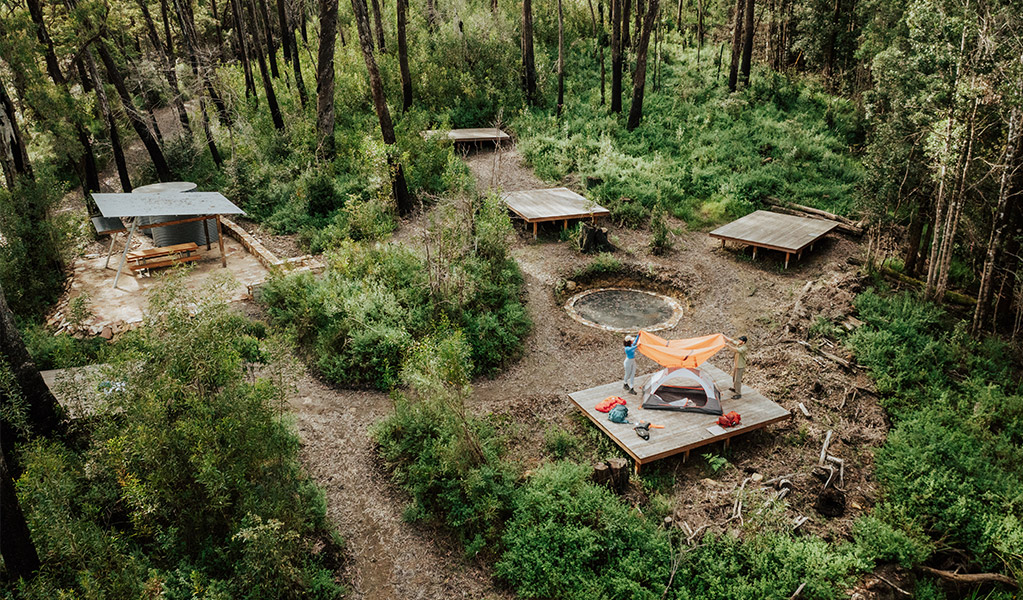 Aerial view of the hardwood tent platforms and facilities at Yelgun Kyoomgun campground. Credit: Daniel Parsons/DCCEEW &copy; Daniel Parsons