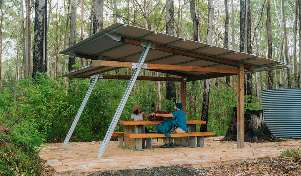 The picnic shelter and rainwater tank at Weeun Weeun campground. Credit: Remy Brand/DCCEEW &copy; Remy Brand