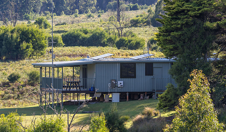 Cedar Creek Lodge is nested into a hillside with a large verandah to enjoy. Credit: David Waugh &copy; DCCEEW