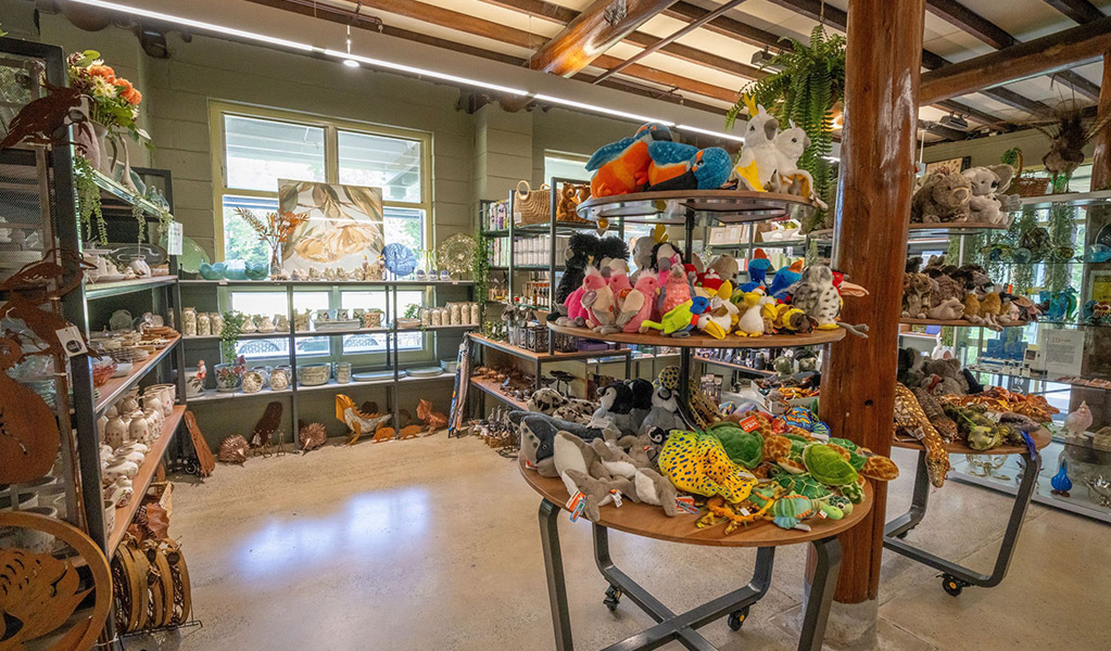 Items from local artists, books and sustainable gifts for all ages on display inside the Royal National Park Visitor Centre shop at Audley Village. Credit: John Spencer &copy; DCCEEW