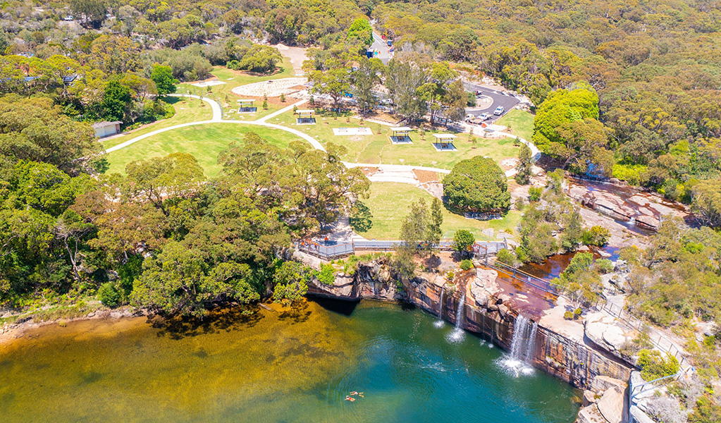 Aerial view of Wattamolla picnic area and the lagoon beneath it in Royal National Park. Credit: Andrew Elliot / DCCEEW &copy; DPE