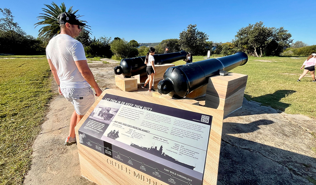People looking at the Outer Fort cannons in Middle Head, Sydney Harbour National Park. Photo: Natasha Webb &copy; DCCEEW/Natasha Webb