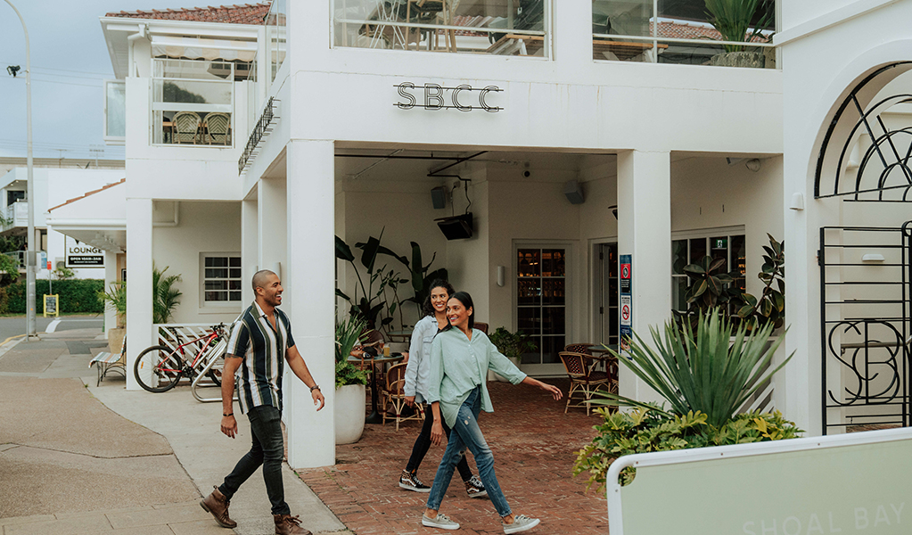 Walkers entering one of many restaurants in the Shoal Bay area. Credit: Remy Brand &copy; Remy Brand