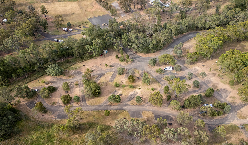 Aerial view of campsites and the road at Camp Blackman. Credit: John Spencer &copy; DCCEEW
