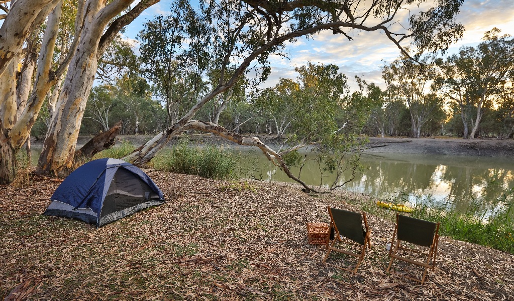 Tent and camp chairs overlooking Yanga Lake at Woolpress Bend campground. Credit: Corey Brown &copy; Corey Brown/OEH