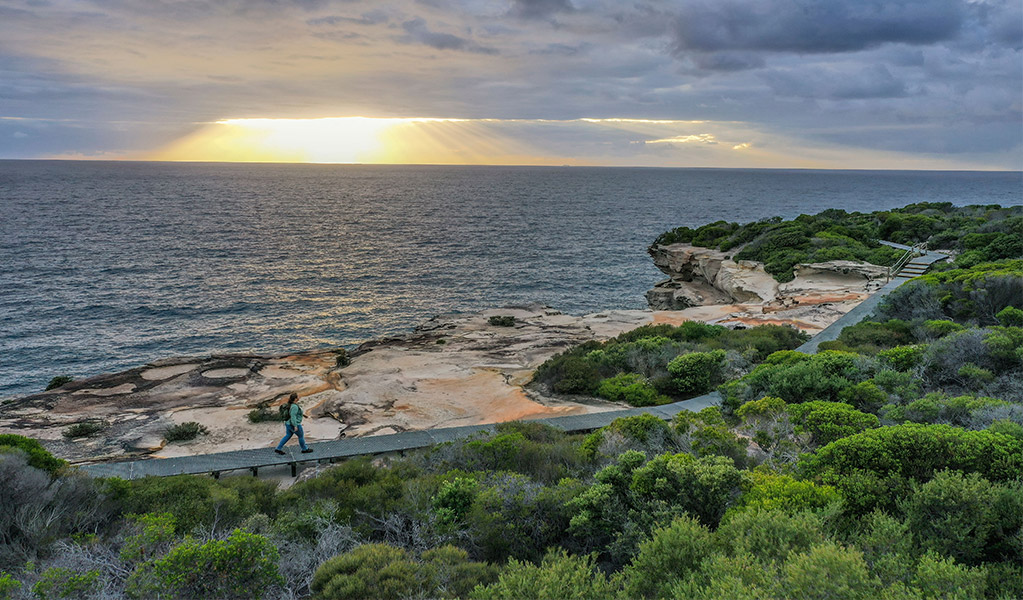 A bushwalker on Boora Point walking track. Credit: John Spencer &copy; DCCEEW