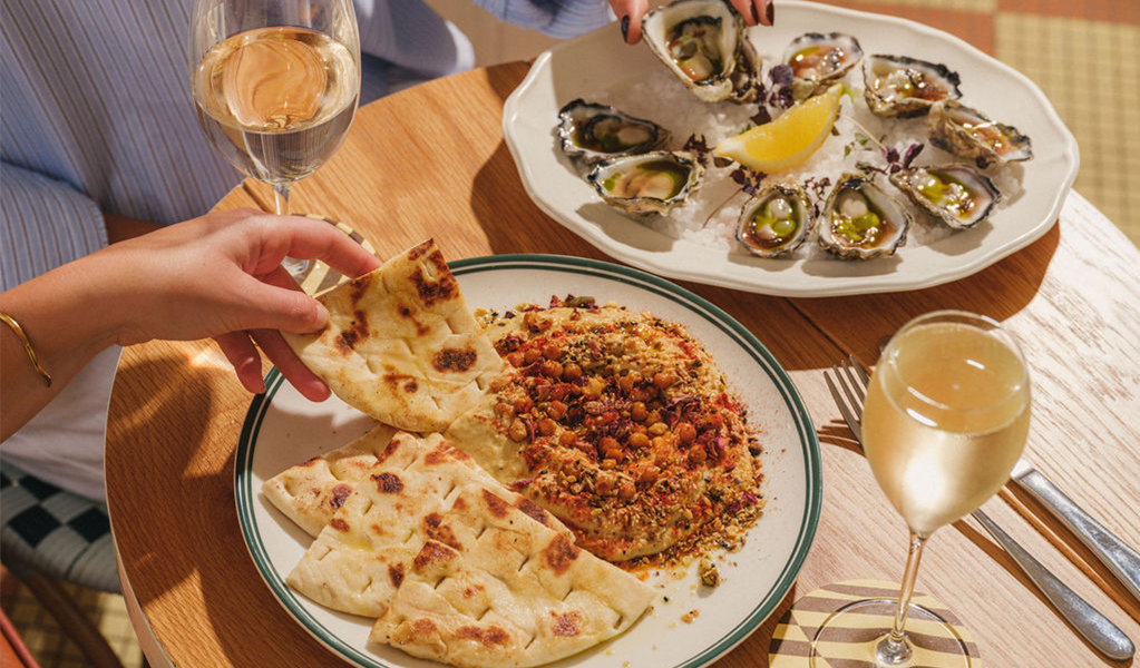 Food and wine served at The Nielsen in Sydney Harbour National Park. Credit &copy; Annie Saba