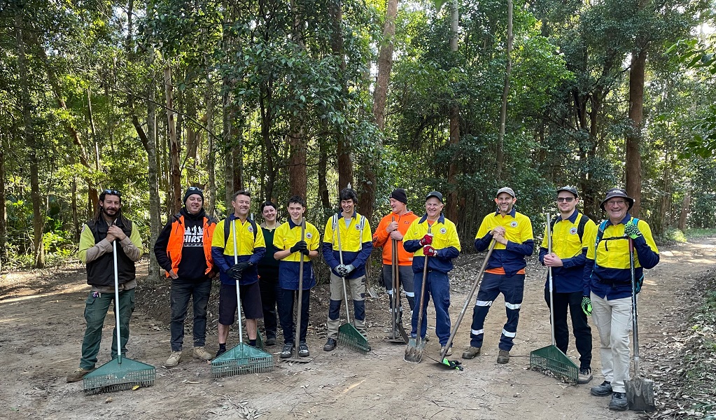 A group of volunteers ready to get to work on the Kembla mountain bike trails, Illawarra State Conservation Area. Credit: Daisy Jenkins/DCCEEW &copy; DCCEEW